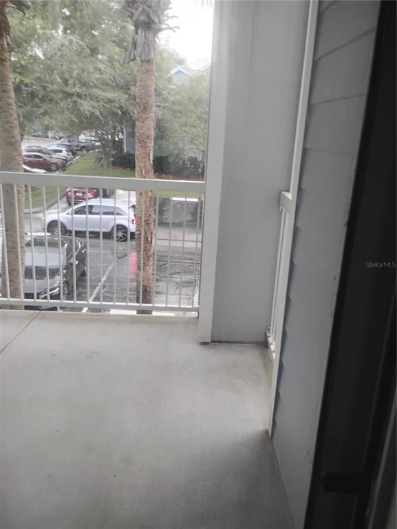 2549 Grassy Point Drive, Unit 203 Lake Mary, FL 32746 - Photo 6 of 22 a view of a room with racks on the wall