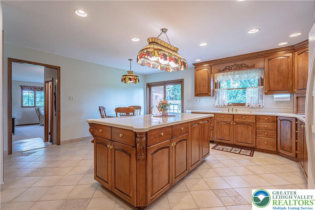 1434 Colgate Drive Bethlehem, PA 18017 - Photo 11 of 37 a kitchen with stainless steel appliances a sink and a large window
