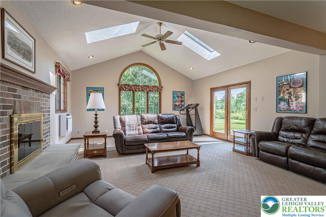 1434 Colgate Drive Bethlehem, PA 18017 - Photo 22 of 37 a living room with furniture and a large window