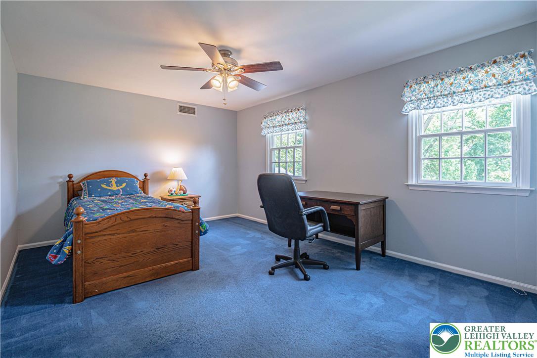 1434 Colgate Drive Bethlehem, PA 18017 - Photo 33 of 37 a bedroom with a workspace