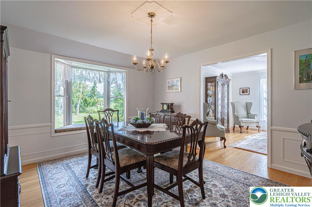 1434 Colgate Drive Bethlehem, PA 18017 - Photo 8 of 37 a view of a dining room with furniture window and wooden floor