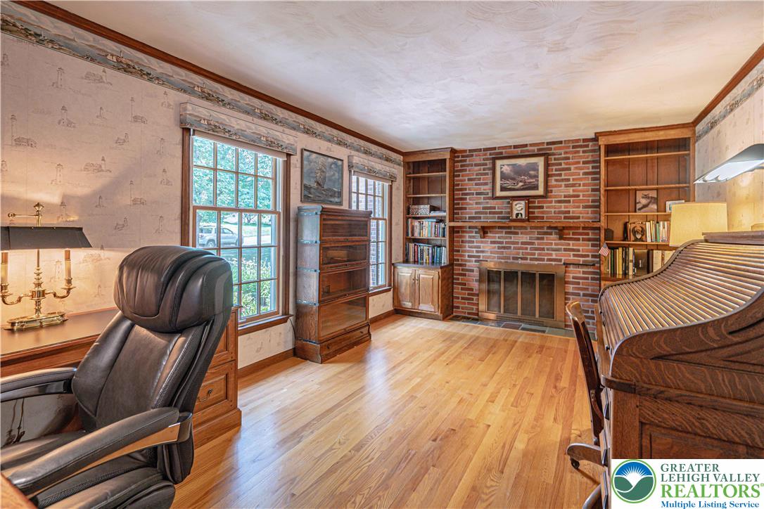 1434 Colgate Drive Bethlehem, PA 18017 - Photo 9 of 37 a living room with furniture fireplace and flat screen tv