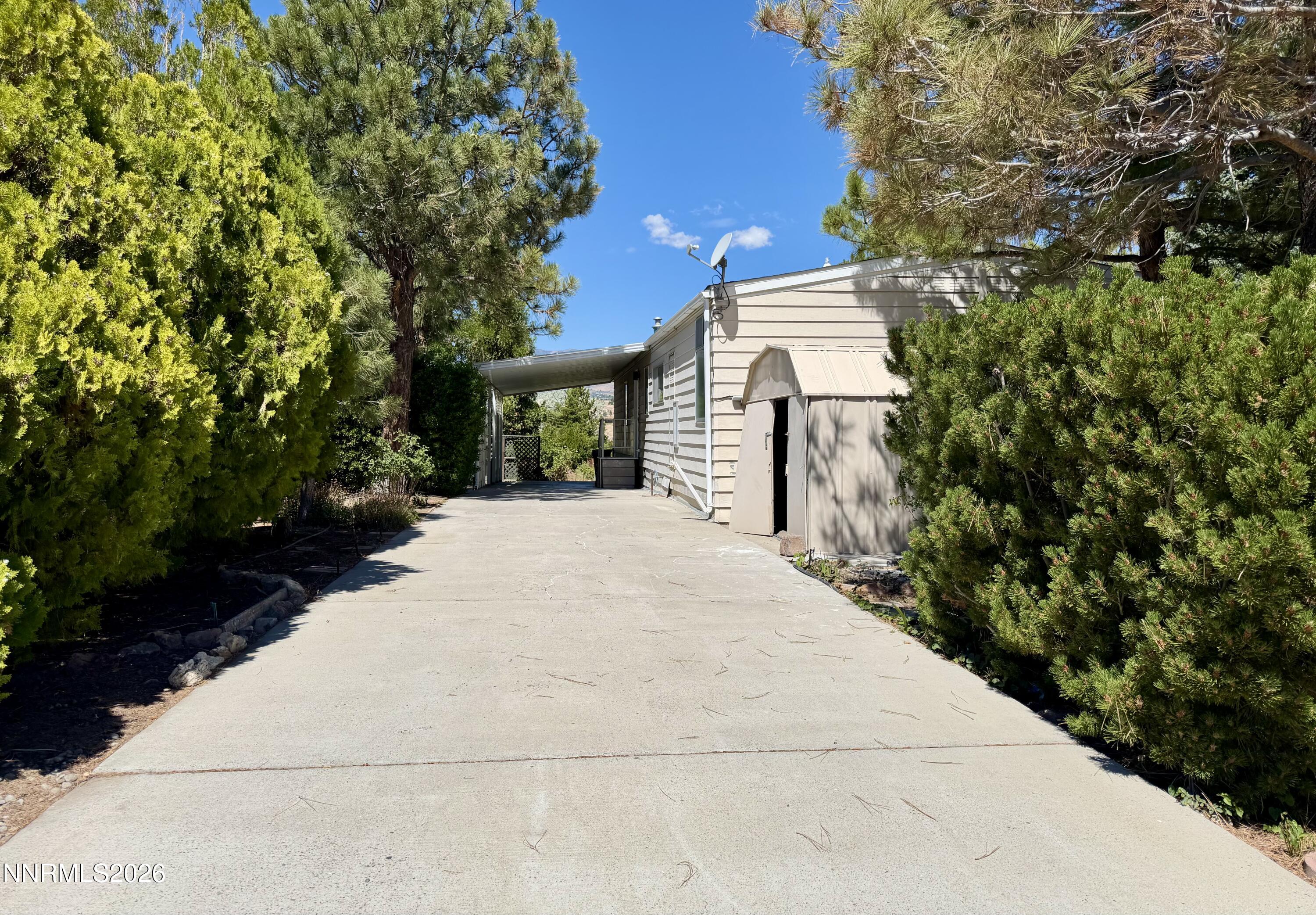 330 Taurus Circle Reno, NV 89521 - Photo 27 of 27 a view of a house with a yard and potted plants
