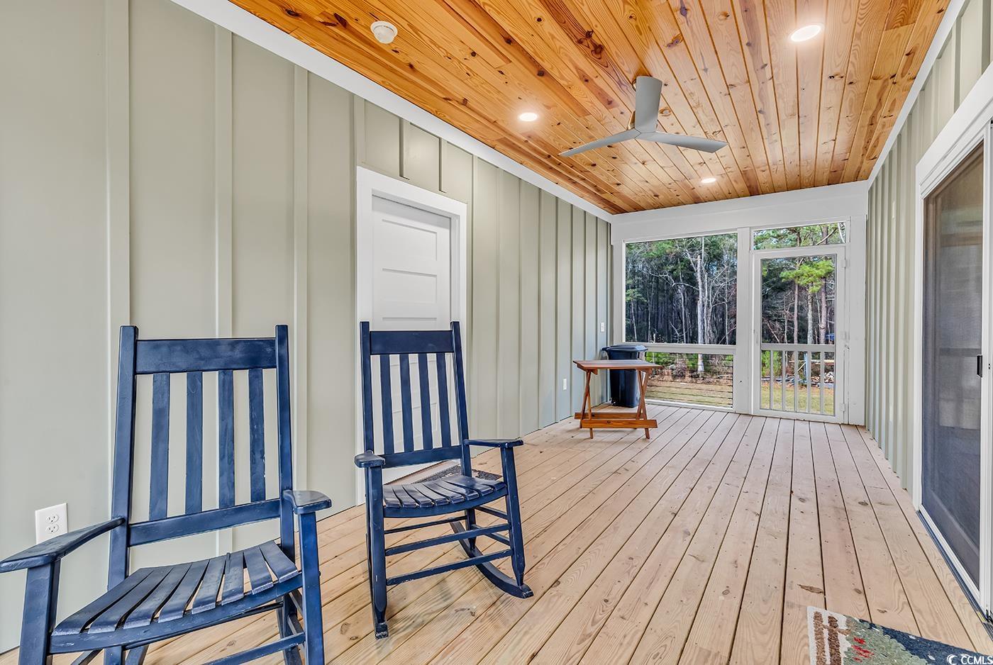 32 Old Place Kingstree, SC 29556 - Photo 16 of 40 Wooden terrace with ceiling fan