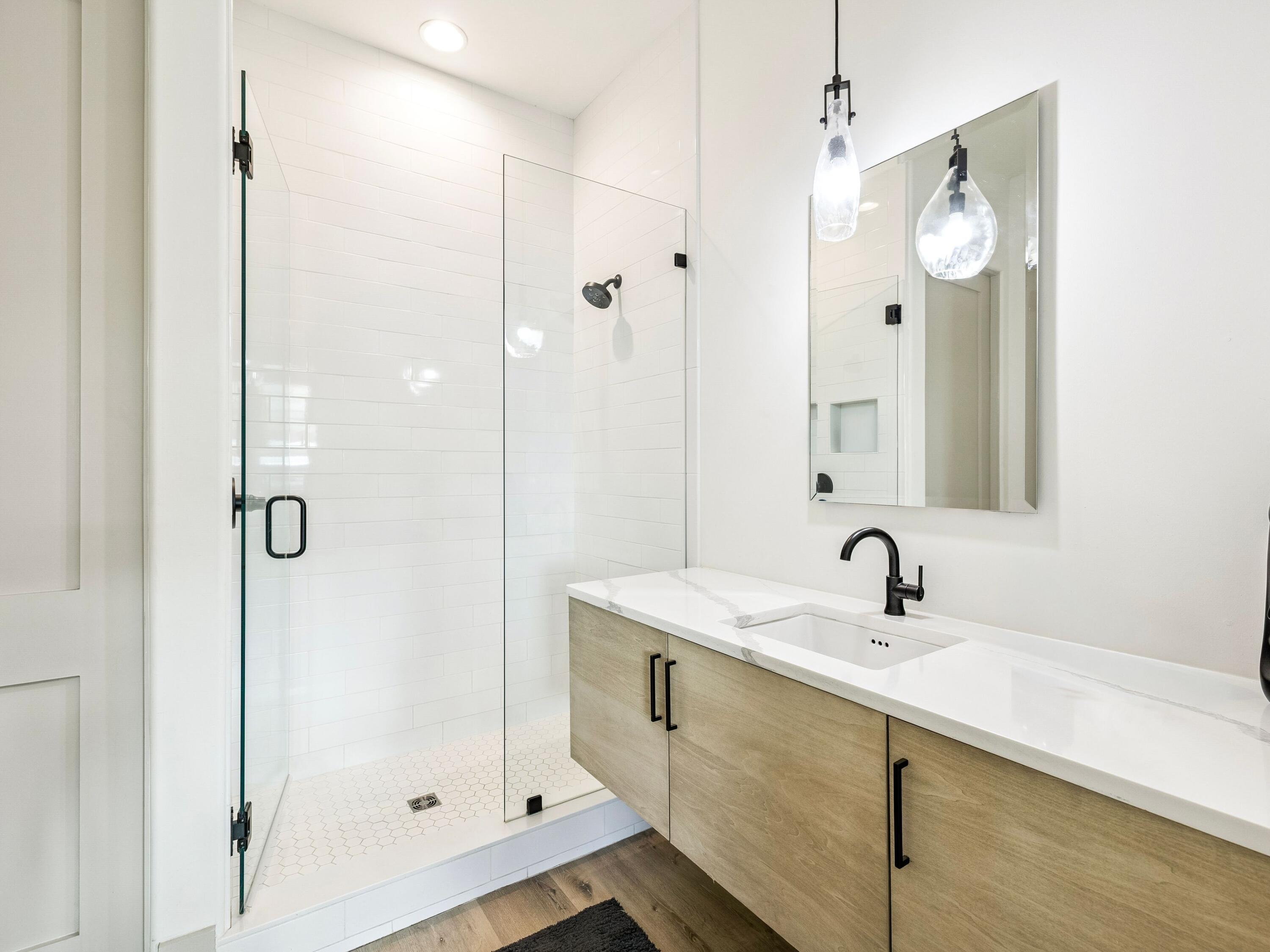 80 Grande Pointe Drive Inlet Beach, FL 32461 - Photo 13 of 68 a bathroom with a shower sink and mirror