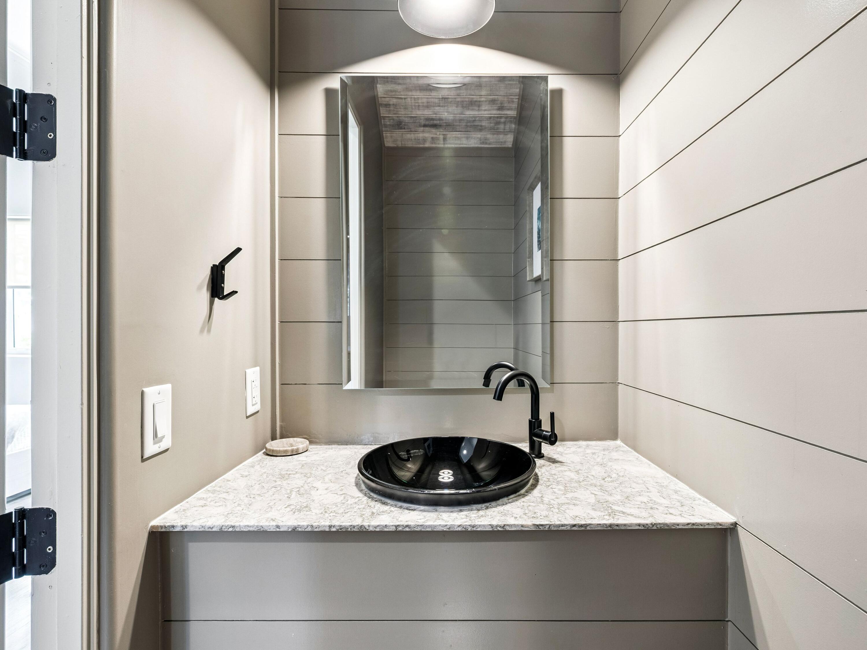 80 Grande Pointe Drive Inlet Beach, FL 32461 - Photo 14 of 68 a bathroom with a granite countertop sink a mirror and shower