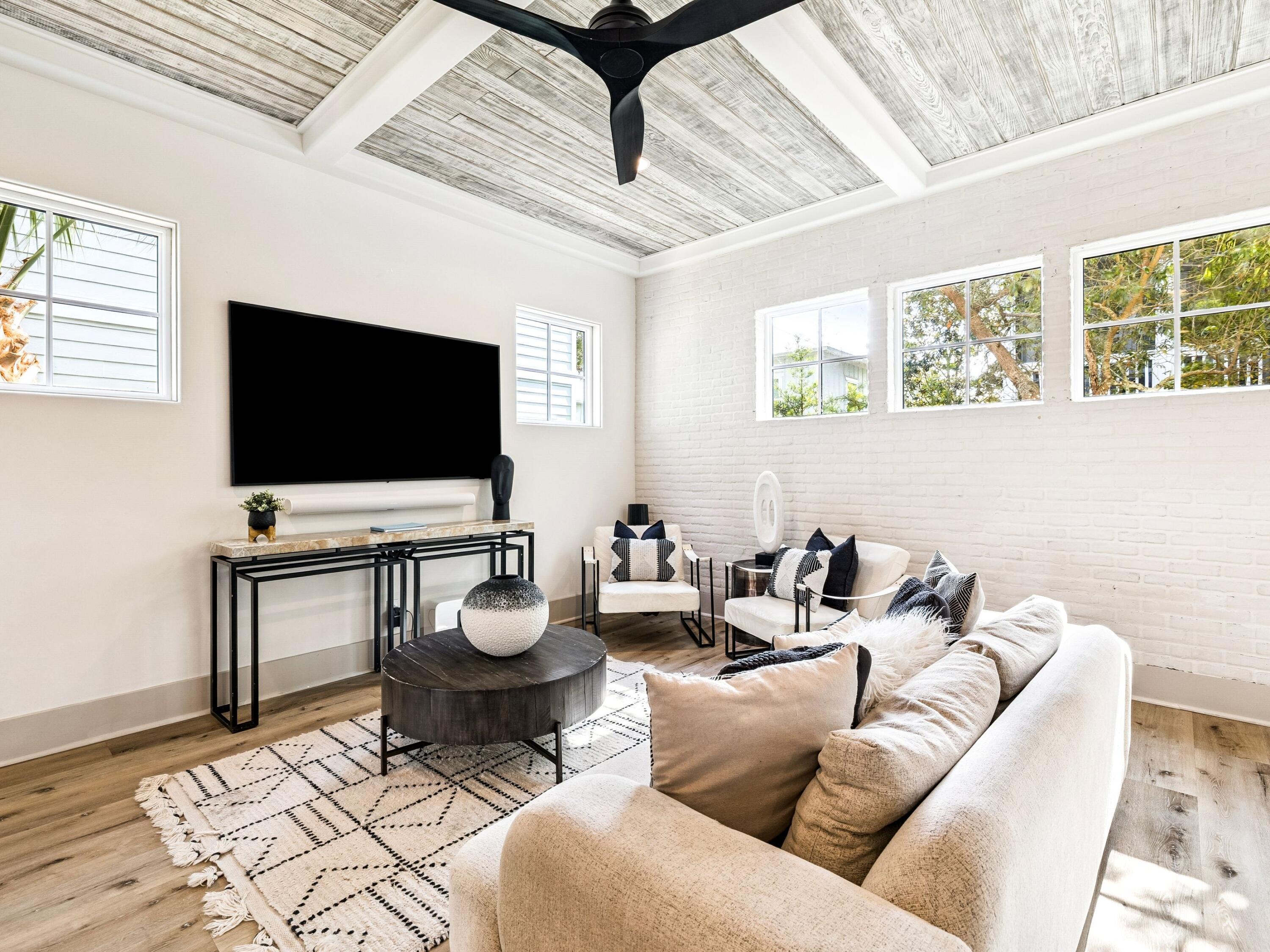 80 Grande Pointe Drive Inlet Beach, FL 32461 - Photo 24 of 68 a living room with furniture and a flat screen tv