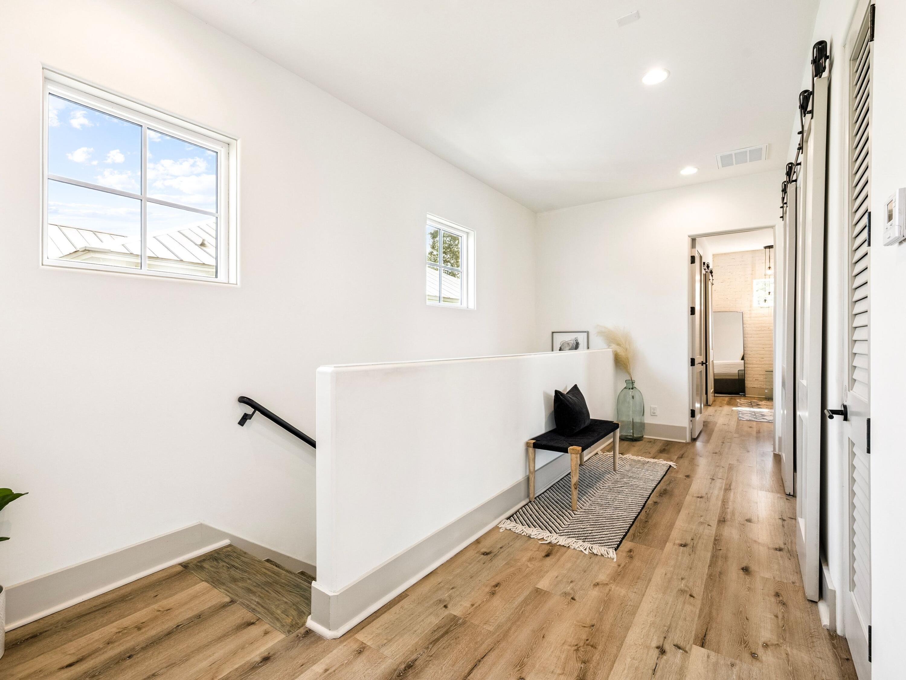 80 Grande Pointe Drive Inlet Beach, FL 32461 - Photo 28 of 68 a view of a room with wooden floor and a bathroom
