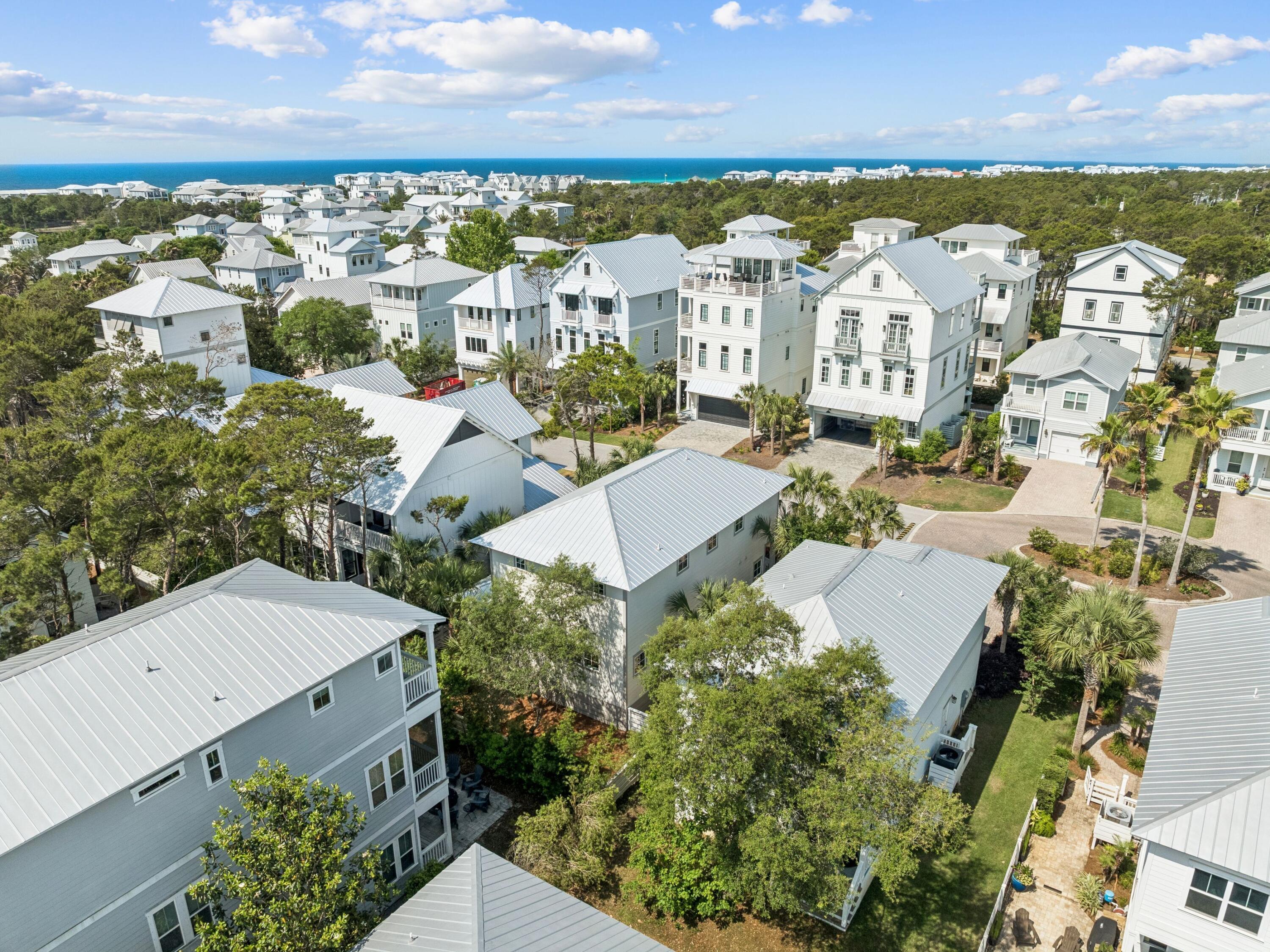 80 Grande Pointe Drive Inlet Beach, FL 32461 - Photo 52 of 68 an aerial view of residential building with outdoor space and ocean view