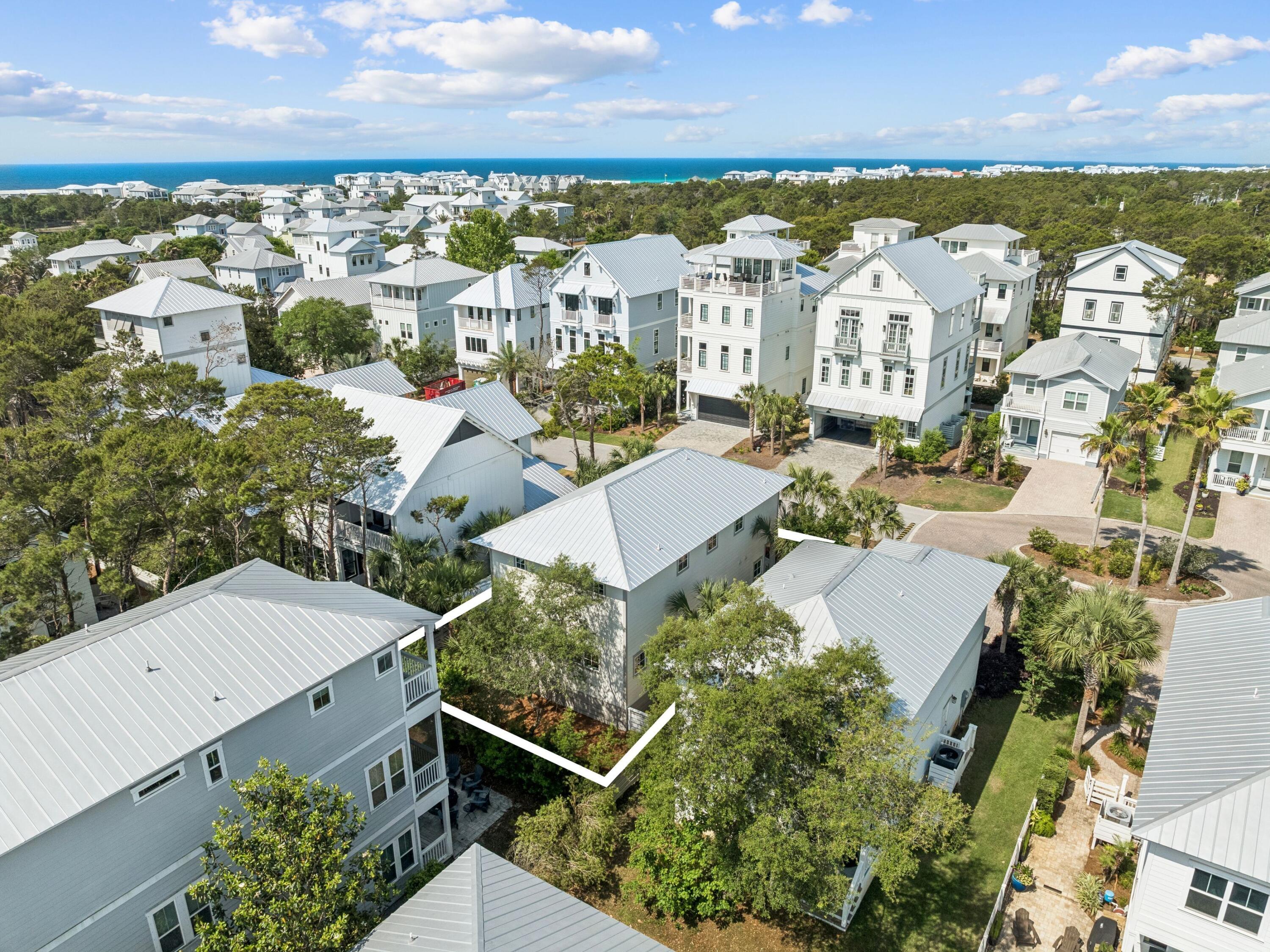 80 Grande Pointe Drive Inlet Beach, FL 32461 - Photo 53 of 68 an aerial view of residential building with outdoor space and ocean view