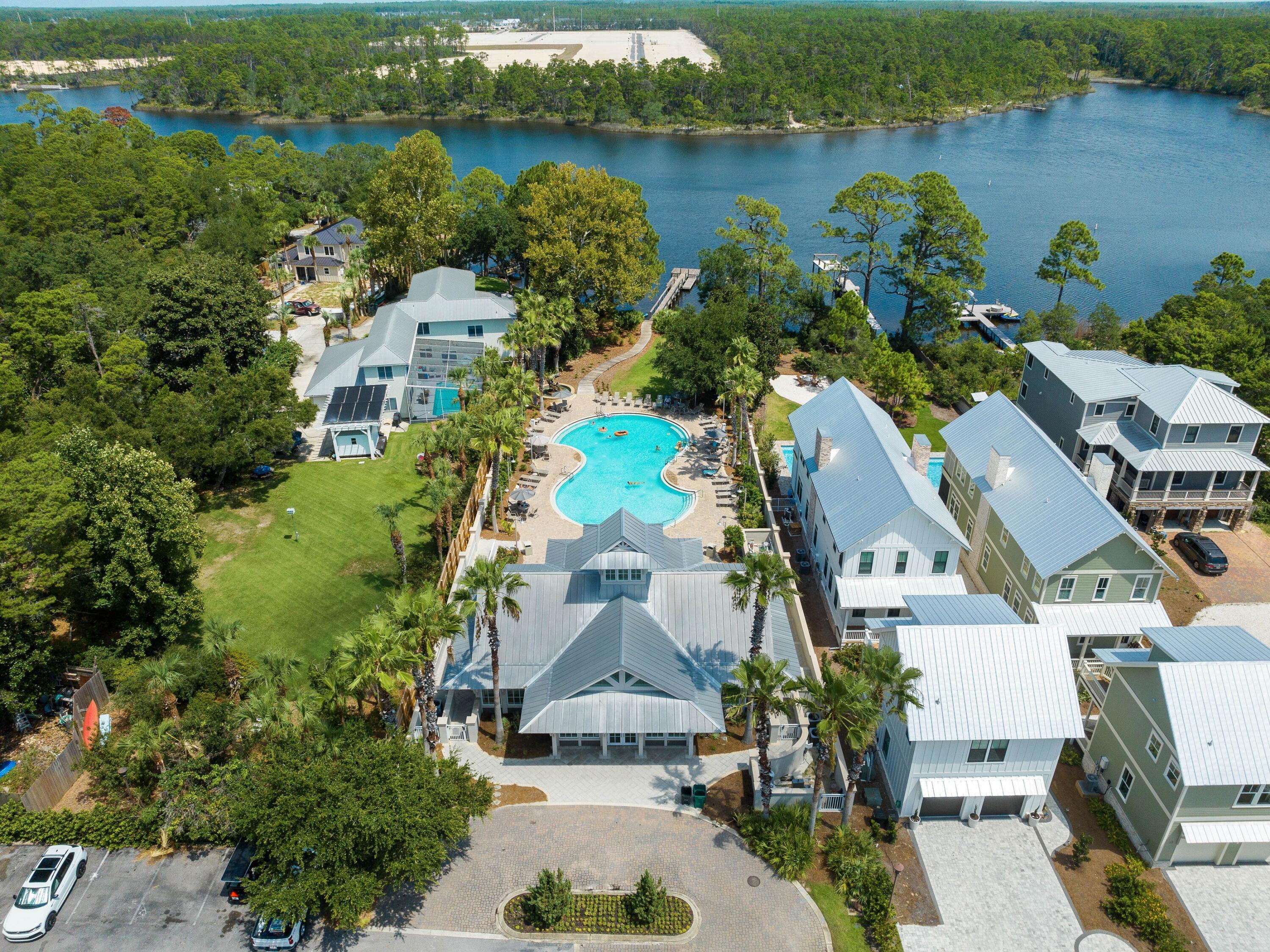 80 Grande Pointe Drive Inlet Beach, FL 32461 - Photo 59 of 68 an aerial view of a house with a lake view