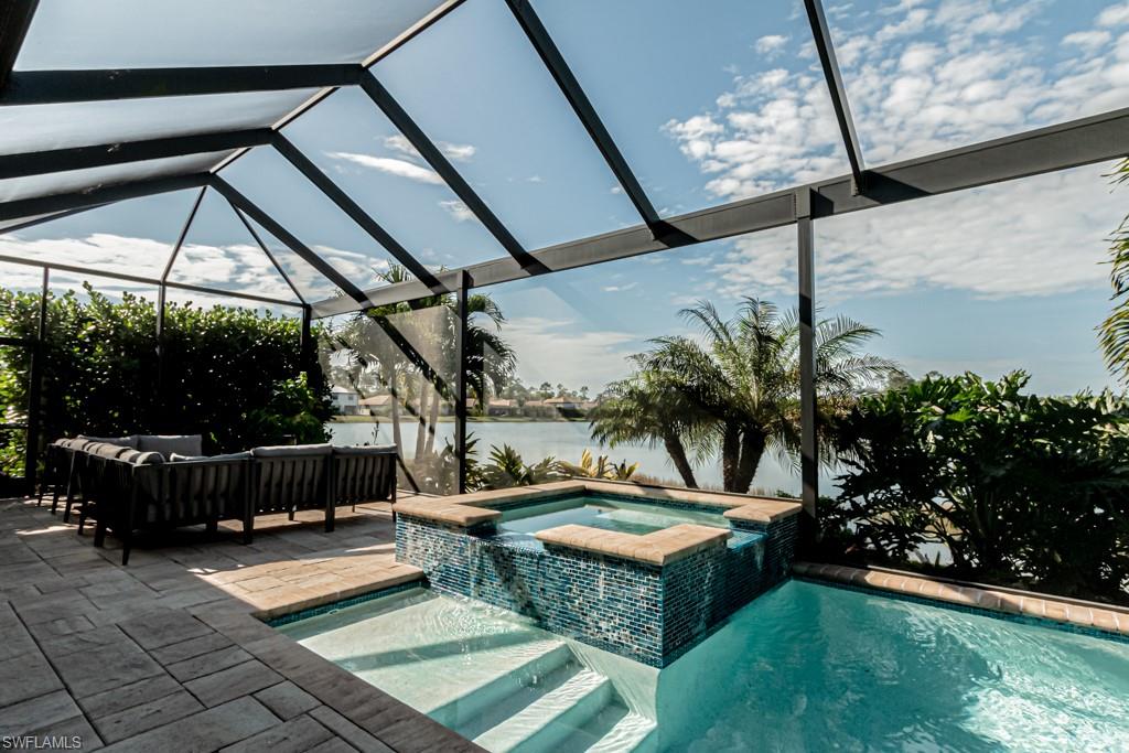 9380 Glenforest Drive Naples, FL 34120 - Photo 43 of 49 a view of an outdoor sitting area