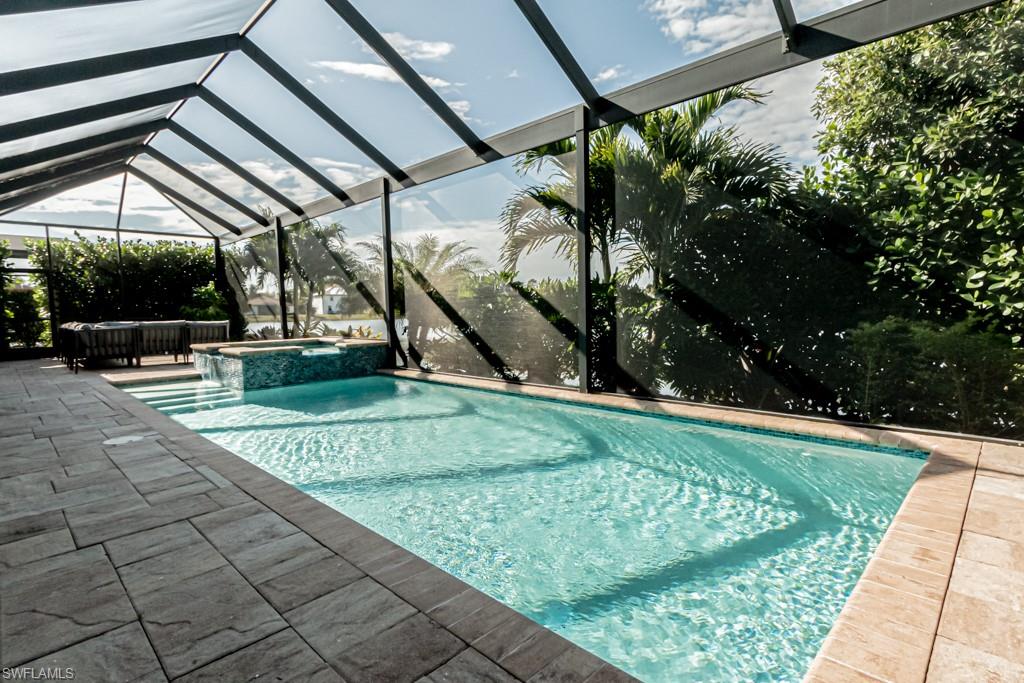 9380 Glenforest Drive Naples, FL 34120 - Photo 44 of 49 a view of a backyard with pathway