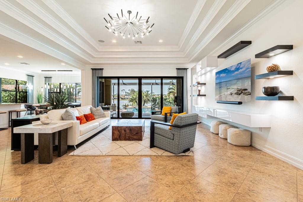 9380 Glenforest Drive Naples, FL 34120 - Photo 7 of 49 a room with stainless steel appliances lots of counter space and furniture