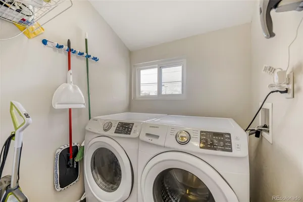 a utility room with dryer and washer