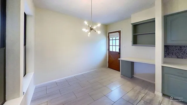 a view of kitchen and hallway