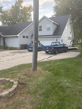 a view of a backyard of the house
