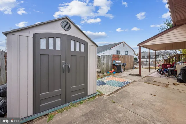 a view of a chairs in front of house