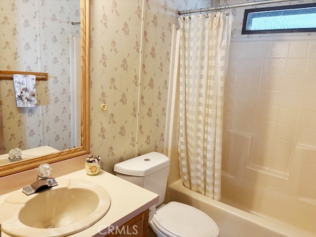 14851 Jeffrey Road, Unit 331 Irvine, CA 92618 - Photo 6 of 12 a bathroom with a sink toilet and shower