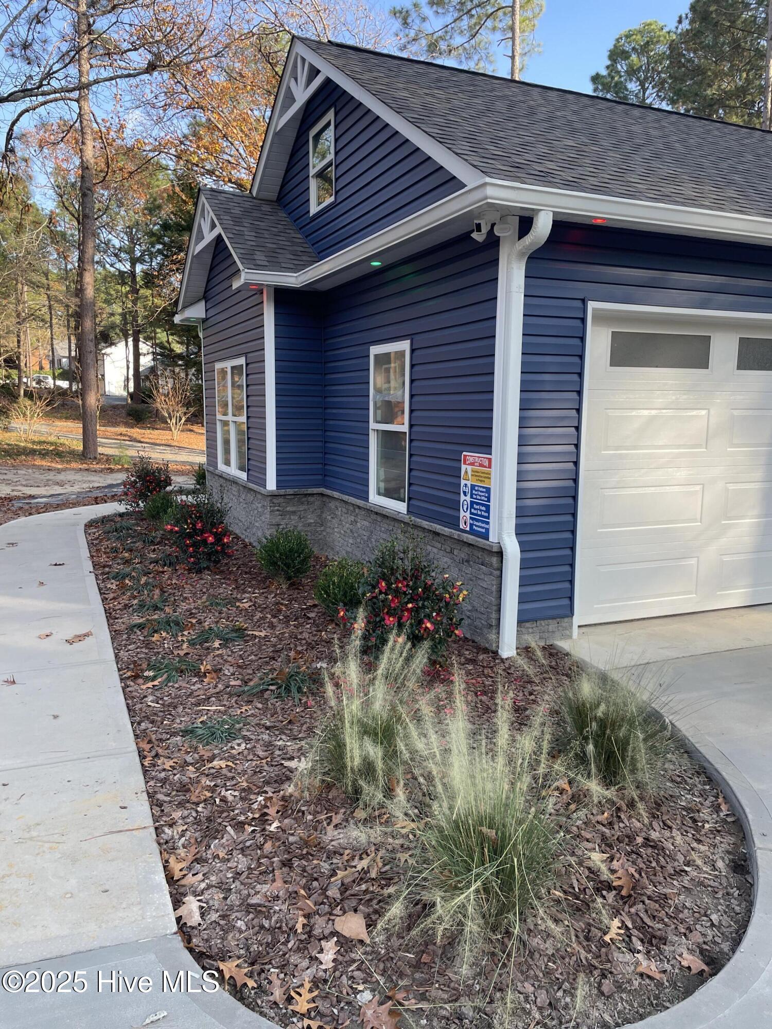 107 Devonshire Avenue West West End, NC 27376 - Photo 21 of 49 Flowering bushes