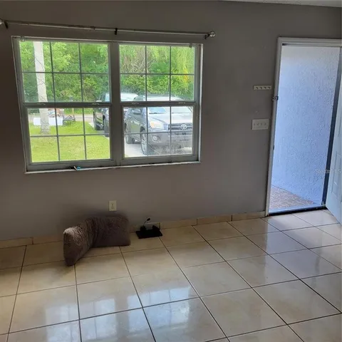 a view of a room with a window