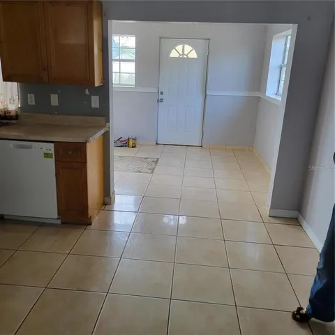 a view of a kitchen with a sink