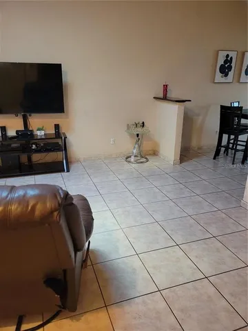 a kitchen with a refrigerator stove and microwave