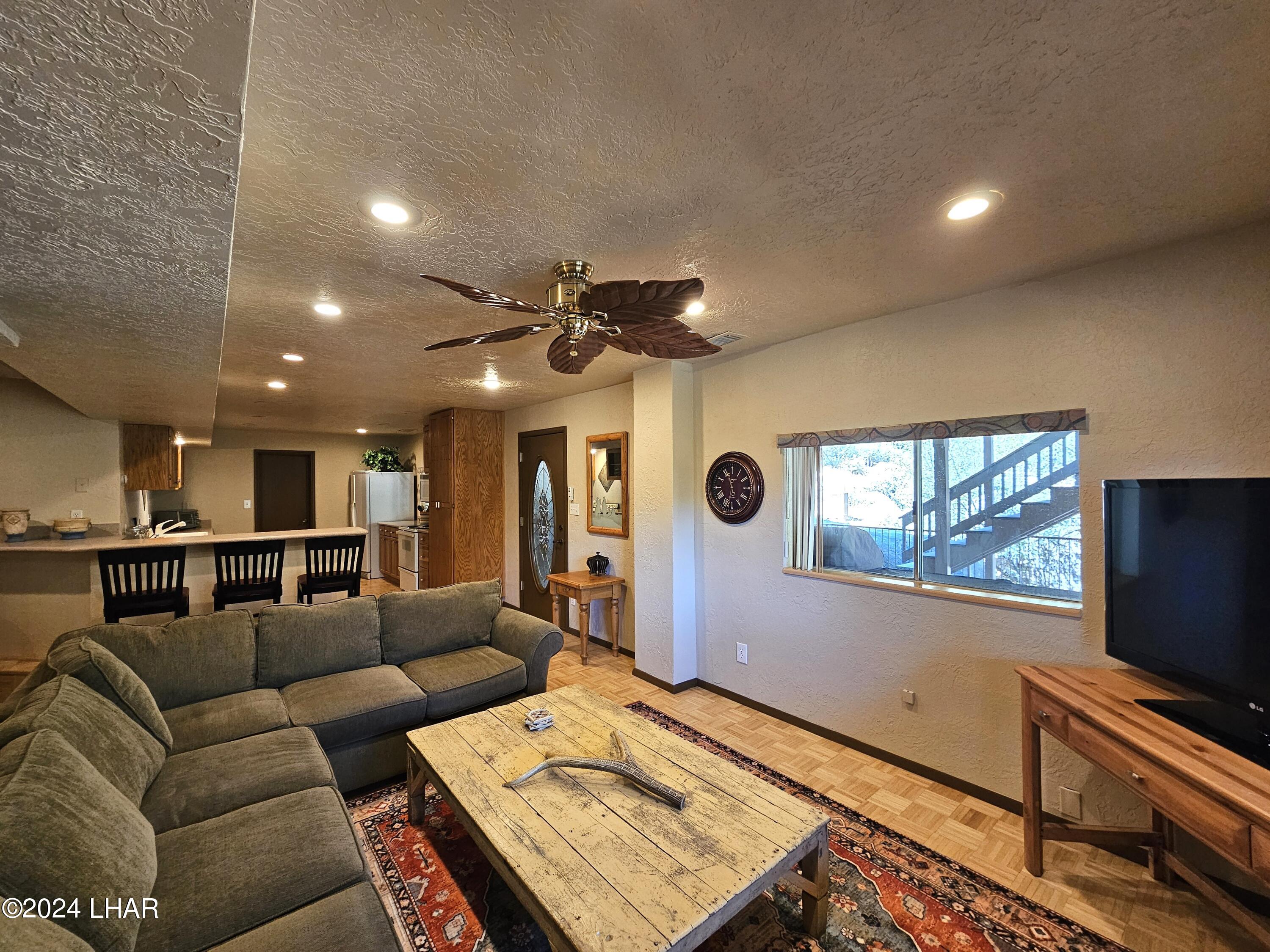 6599 Flag Mine Road Kingman, AZ 86401 - Photo 54 of 63 MAIN DOOR FROM LIVING ROOM TO FRONT PATIO.