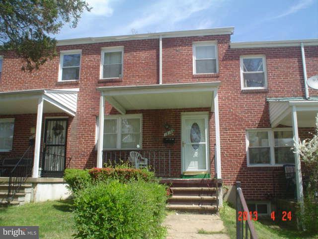 1818 Swansea Road Baltimore, MD 21239 - Photo 1 of 11 front view of a house with a yard