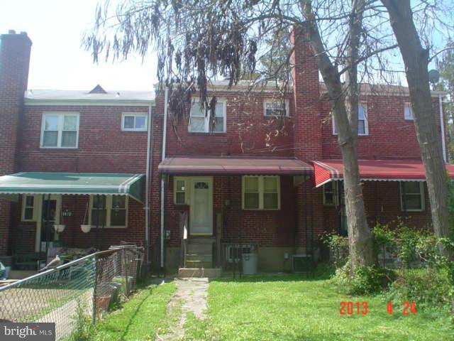 1818 Swansea Road Baltimore, MD 21239 - Photo 2 of 11 a view of a house with a yard and plants