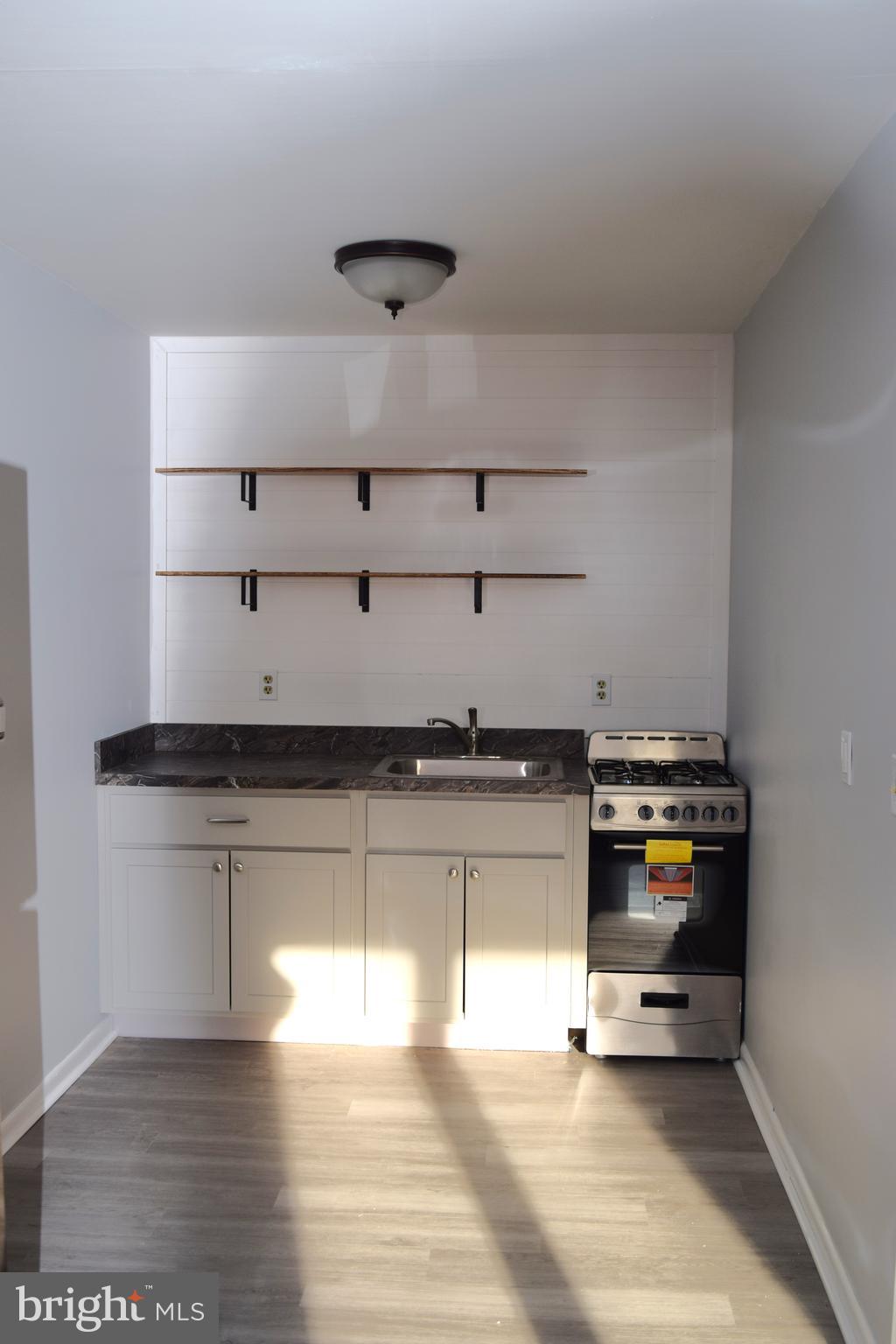 901 Laurel Street, Unit 1 Lebanon, PA 17046 - Photo 3 of 9 a view of workspace with wooden floor