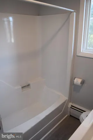 a bathroom with a bathtub