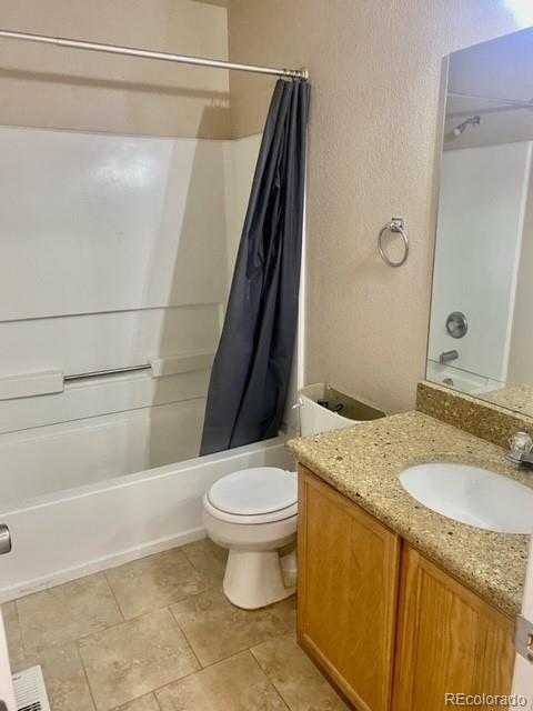 12337 Crystal Downs Road Peyton, CO 80831 - Photo 13 of 22 a bathroom with a granite countertop sink toilet and shower