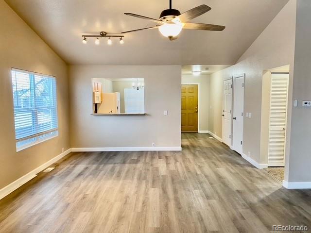 12337 Crystal Downs Road Peyton, CO 80831 - Photo 3 of 22 wooden floor in an empty room with a window