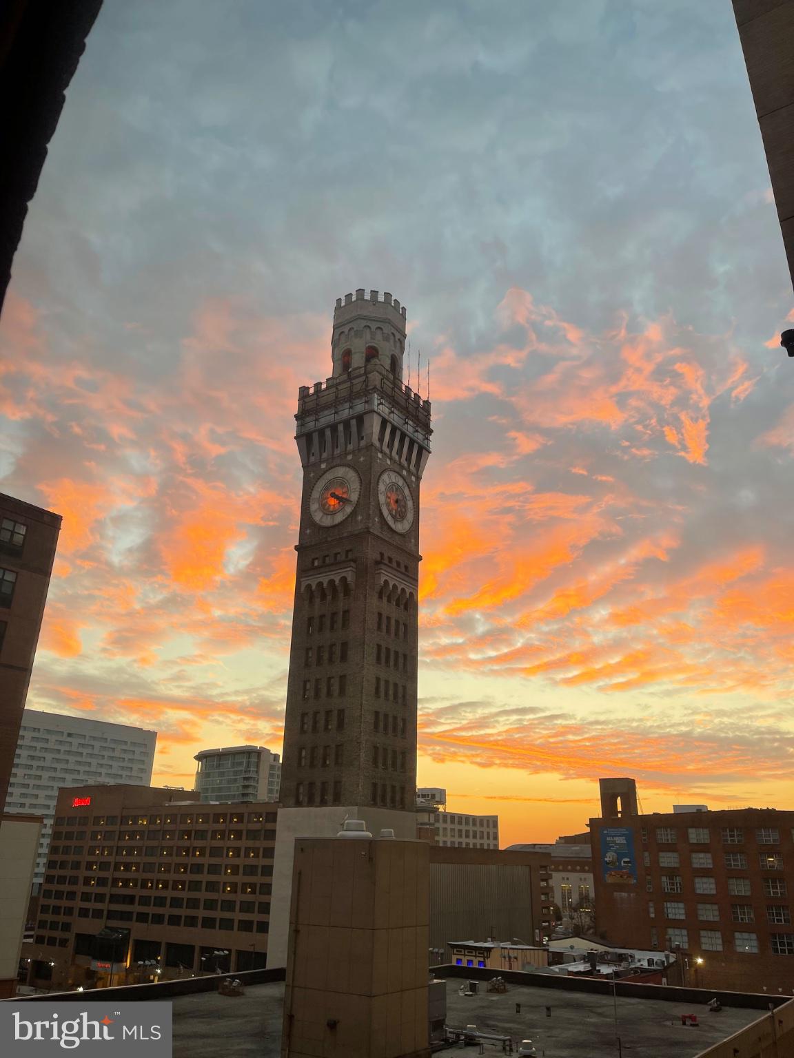 22 South Howard Street, Unit R503 Baltimore, MD 21201 - Photo 30 of 35 Sunset Glow Over Historic Clock Tower