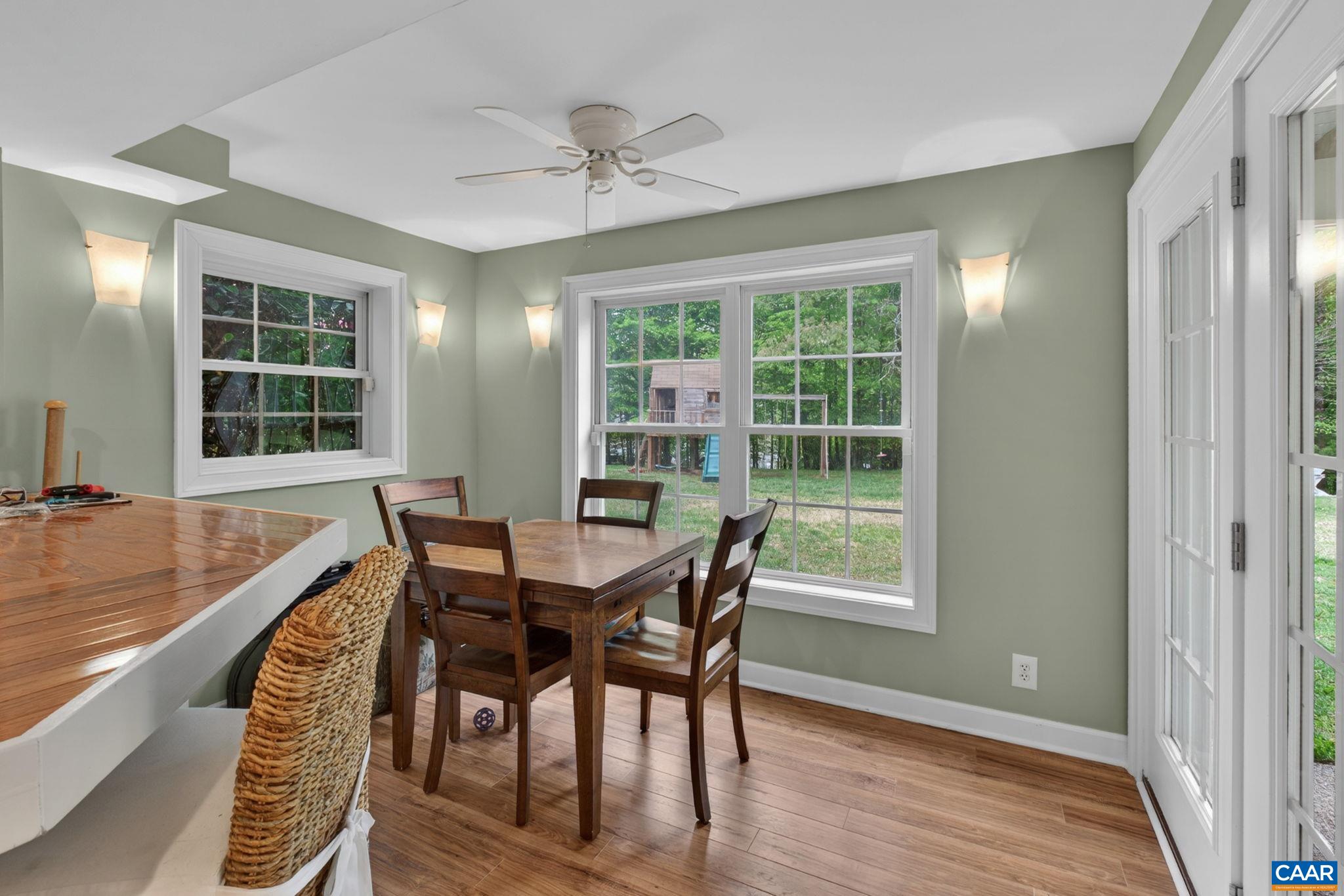 511 Taylor Ridge Way Palmyra, VA 22963 - Photo 39 of 57 a view of a dining room with furniture window and wooden floor