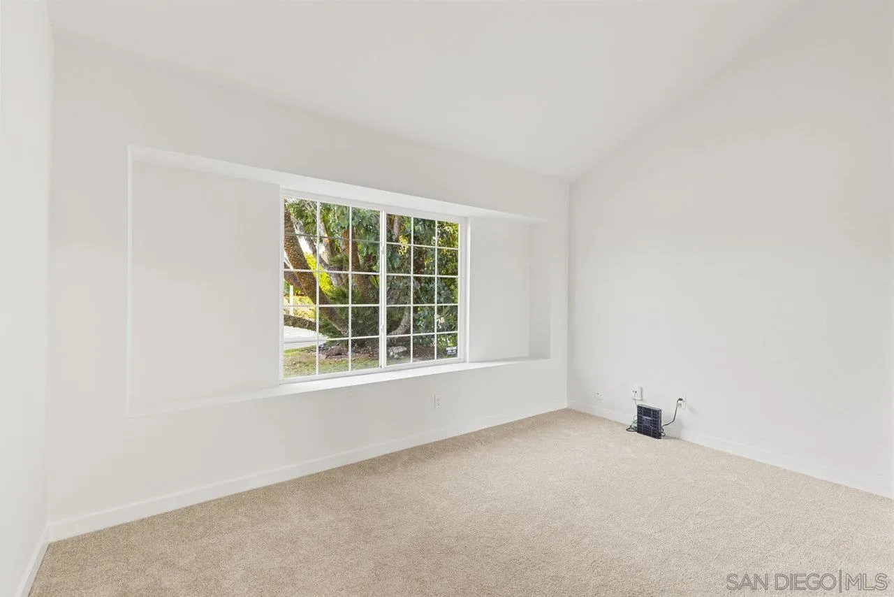 1066 Fulton Road San Marcos, CA 92069 - Photo 18 of 36 an empty room with a window