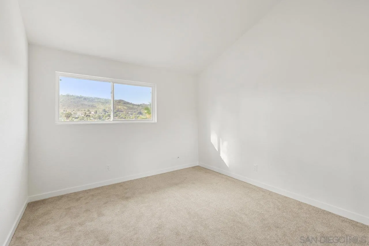 1066 Fulton Road San Marcos, CA 92069 - Photo 19 of 36 an empty room with a window