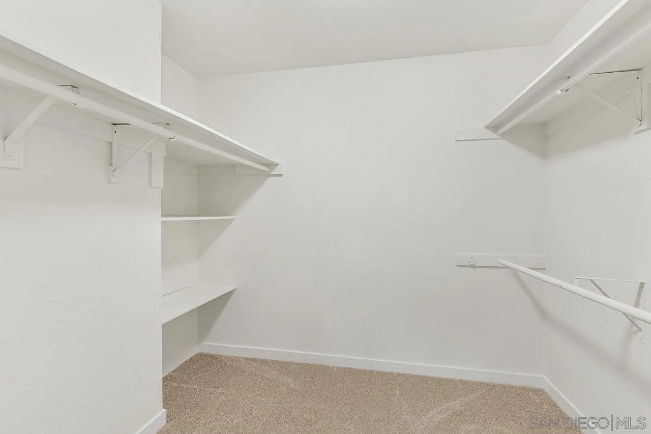 1066 Fulton Road San Marcos, CA 92069 - Photo 25 of 36 a view of an empty walk in closet