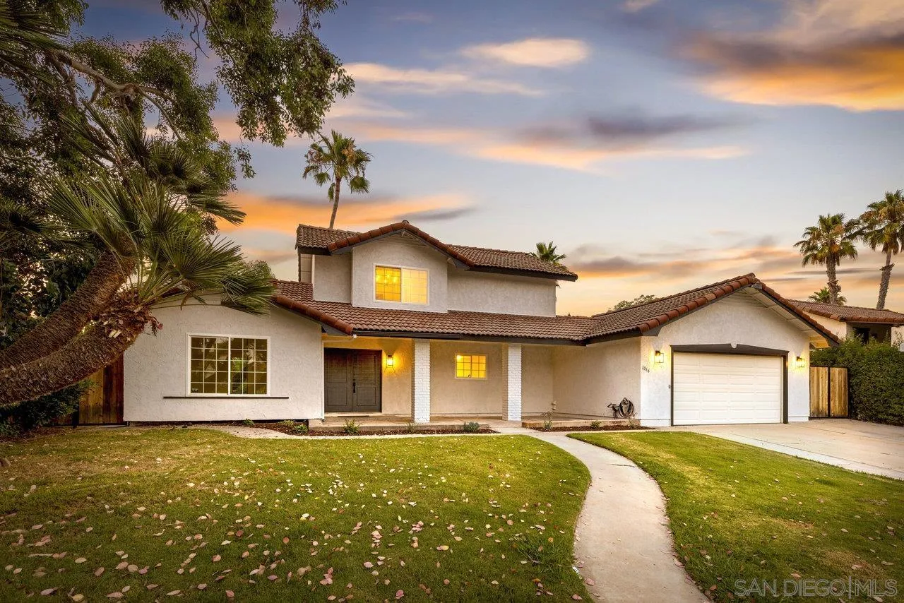 1066 Fulton Road San Marcos, CA 92069 - Photo 26 of 36 a front view of a house with a garden