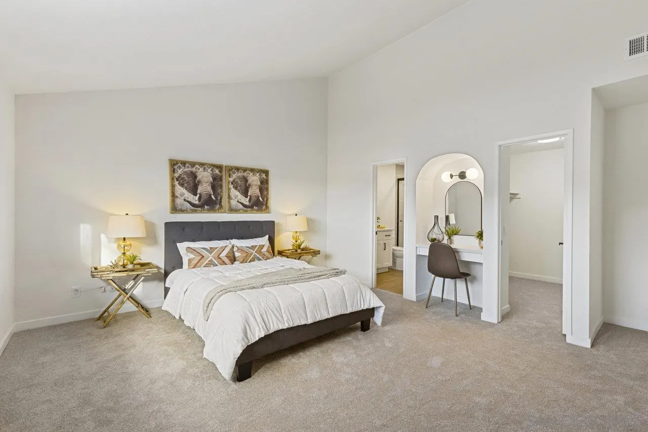 1066 Fulton Road San Marcos, CA 92069 - Photo 5 of 36 a bedroom with a bed and a table