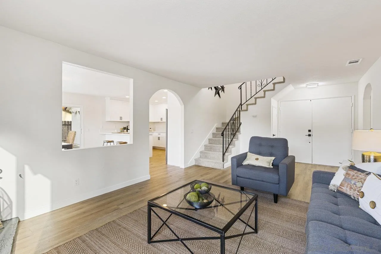 1066 Fulton Road San Marcos, CA 92069 - Photo 9 of 36 a living room with furniture and wooden floor