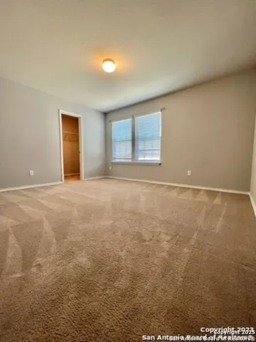 a view of an empty room with window