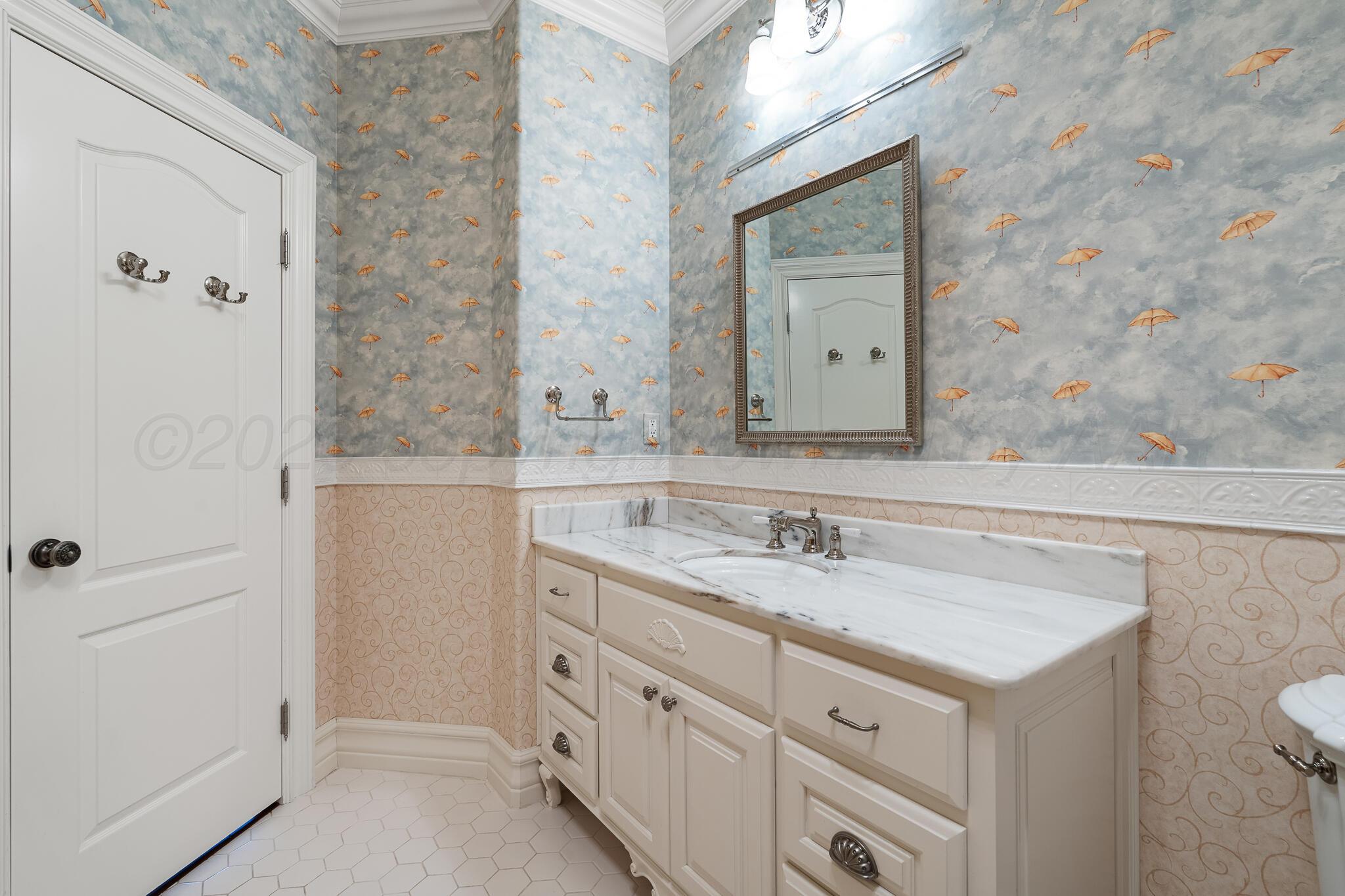18 Cypress Point Amarillo, TX 79124 - Photo 73 of 95 a bathroom with a sink vanity and mirror