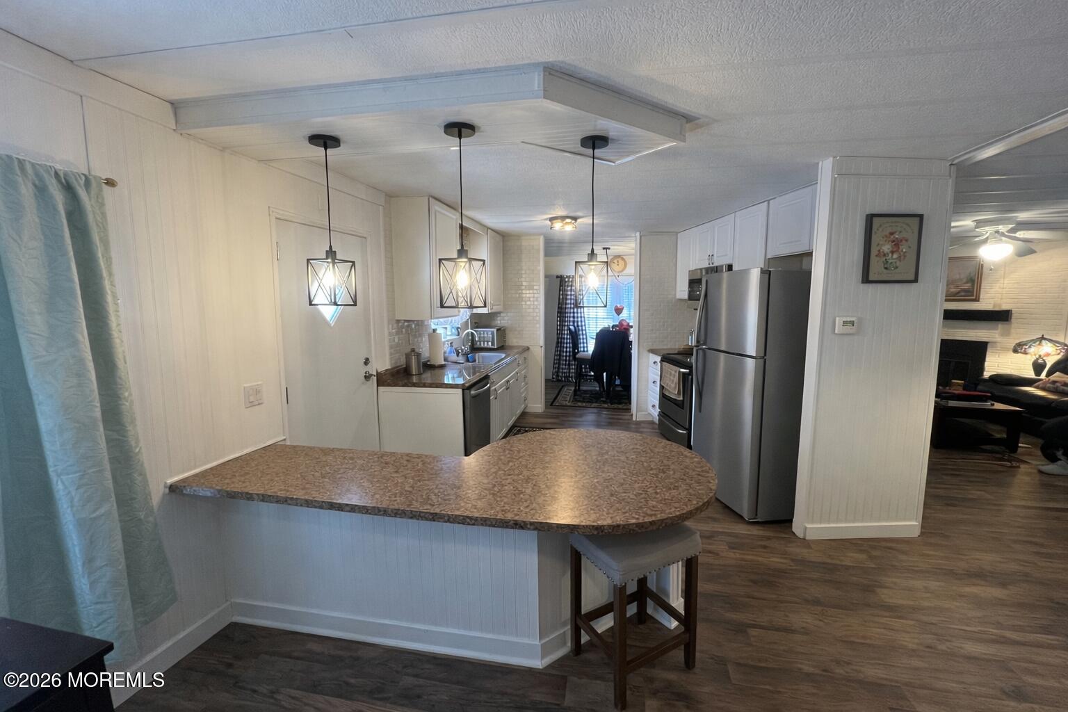 3 Arbor Street Whiting, NJ 08759 - Photo 16 of 42 a kitchen with stainless steel appliances granite countertop a refrigerator a sink and a stove