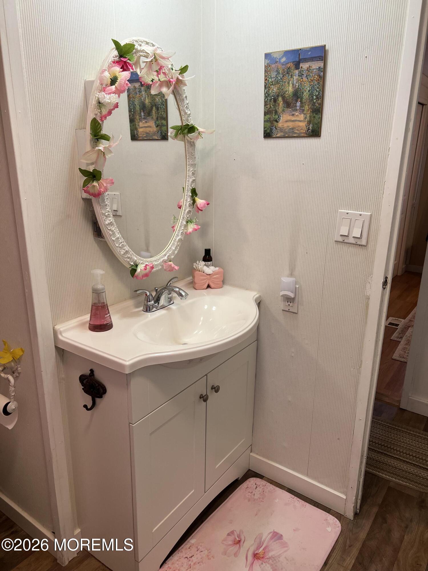 3 Arbor Street Whiting, NJ 08759 - Photo 19 of 42 a bathroom with a sink and mirror