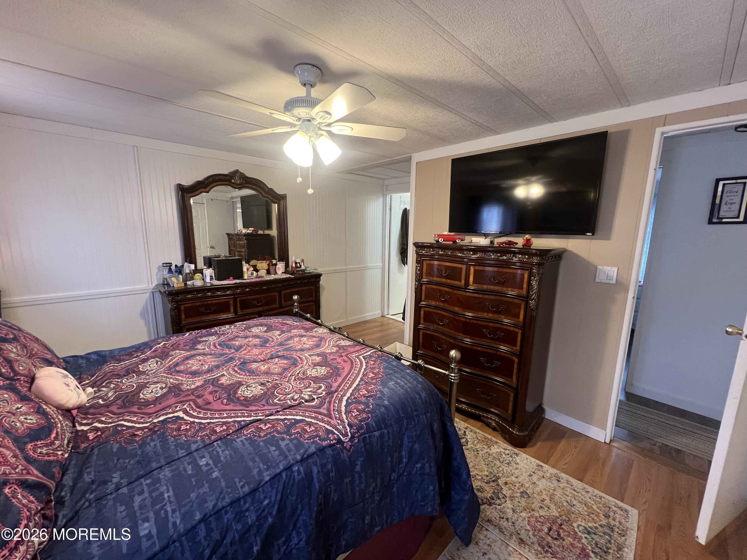 3 Arbor Street Whiting, NJ 08759 - Photo 21 of 42 a bedroom with a bed and a flat screen tv