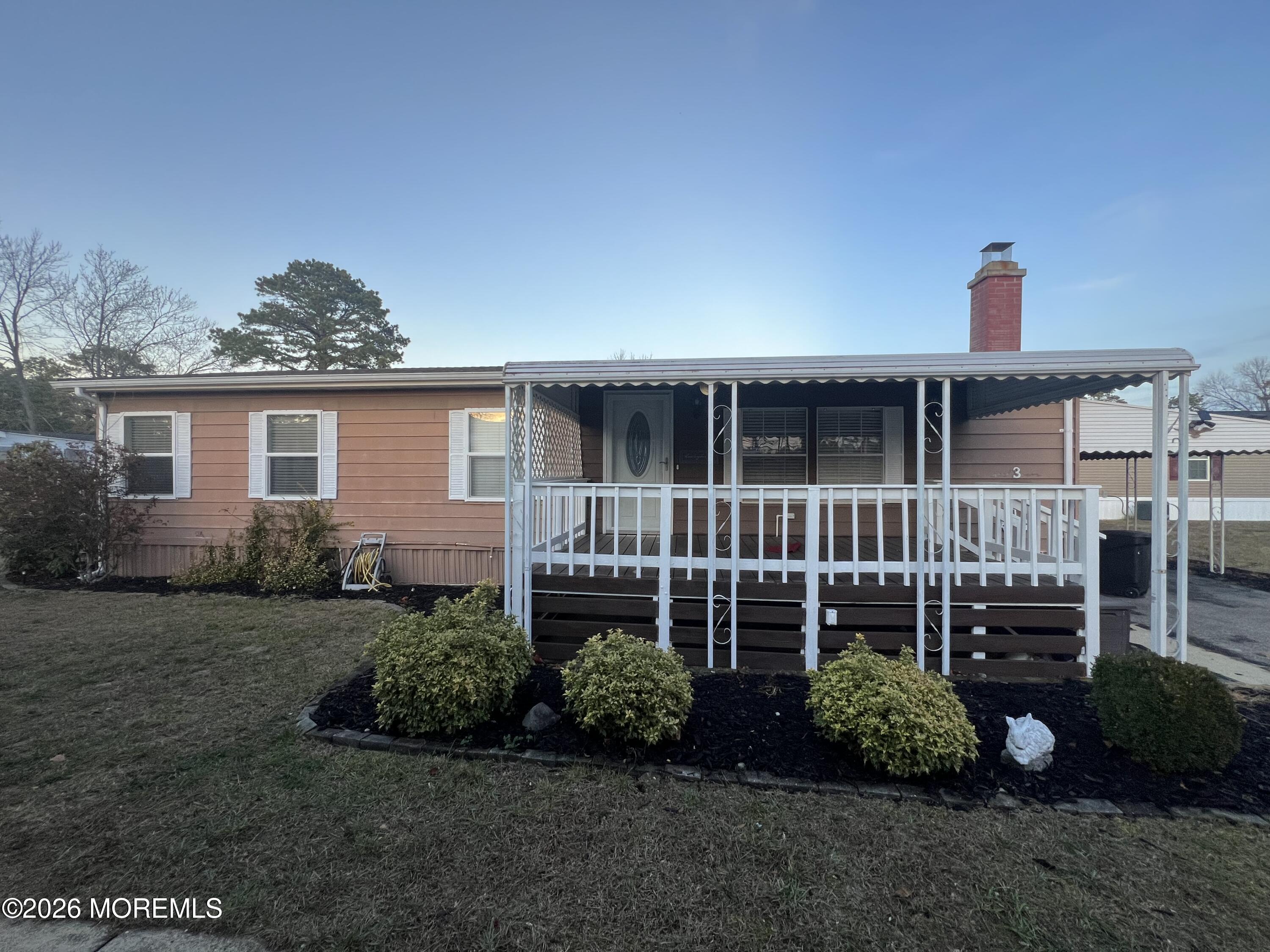 3 Arbor Street Whiting, NJ 08759 - Photo 23 of 42 a front view of a house with a garden