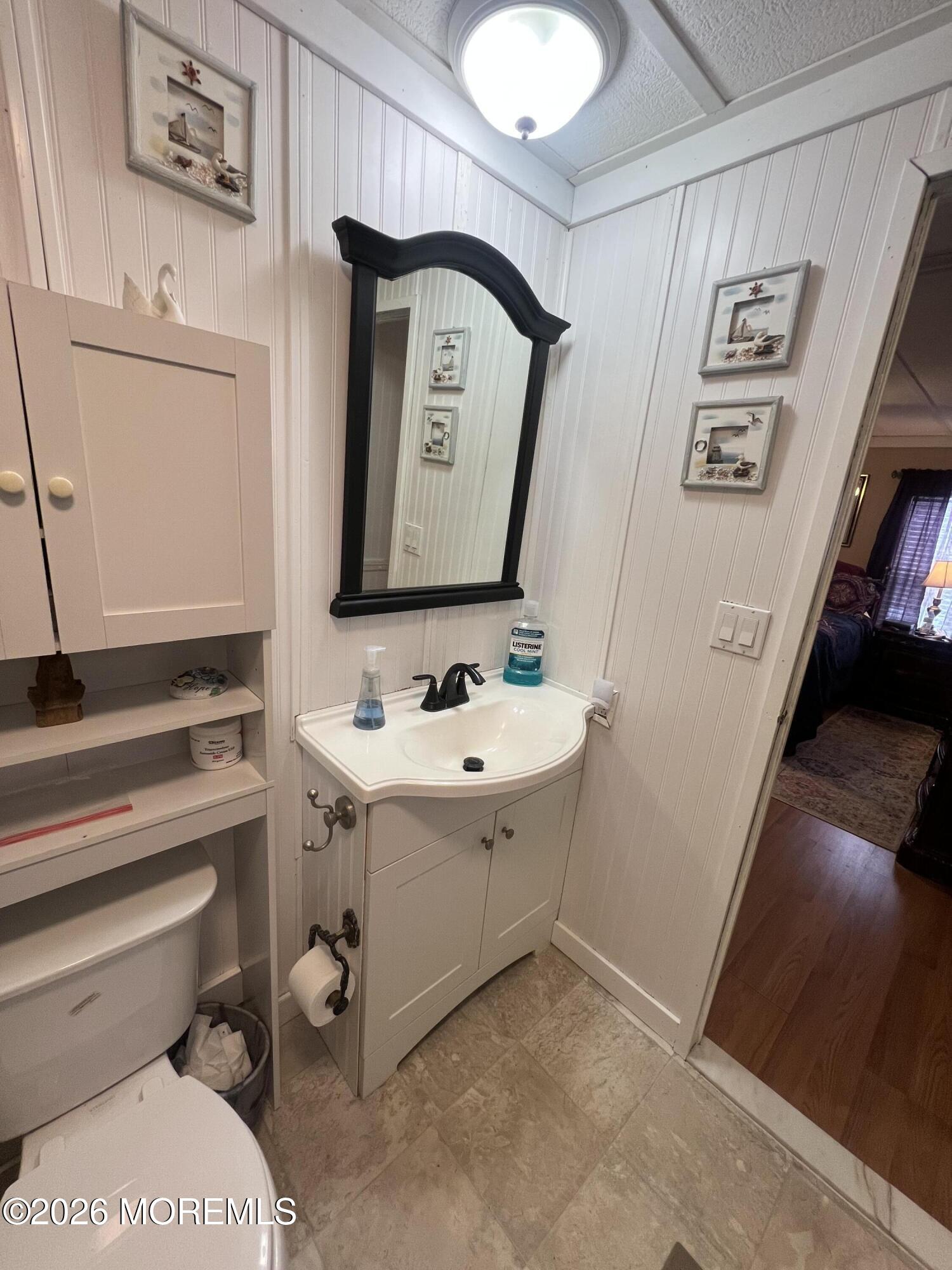 3 Arbor Street Whiting, NJ 08759 - Photo 34 of 42 a bathroom with a toilet sink and mirror