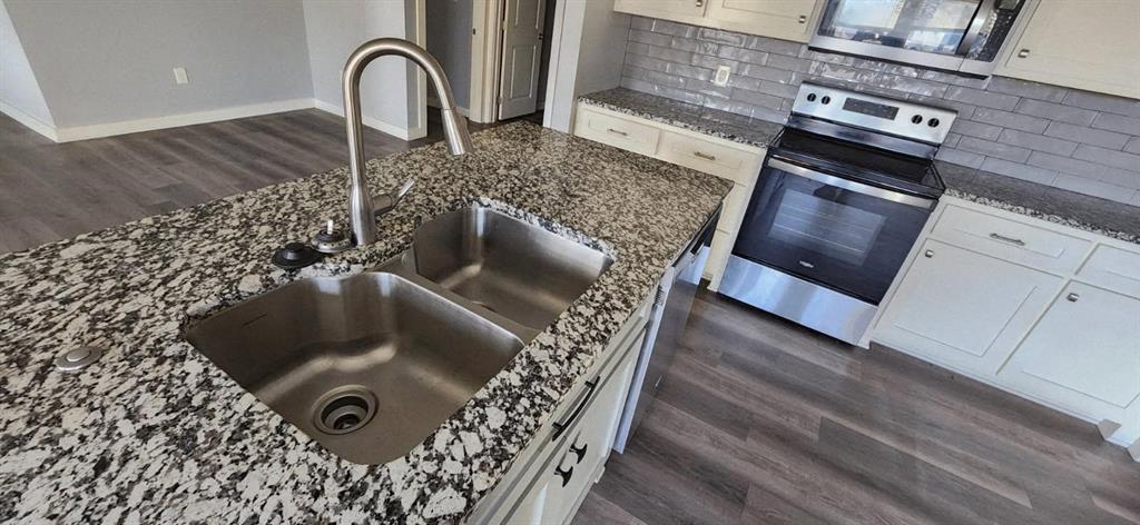 2235 North Pacific Street Mineola, TX 75773 - Photo 7 of 21 Kitchen island